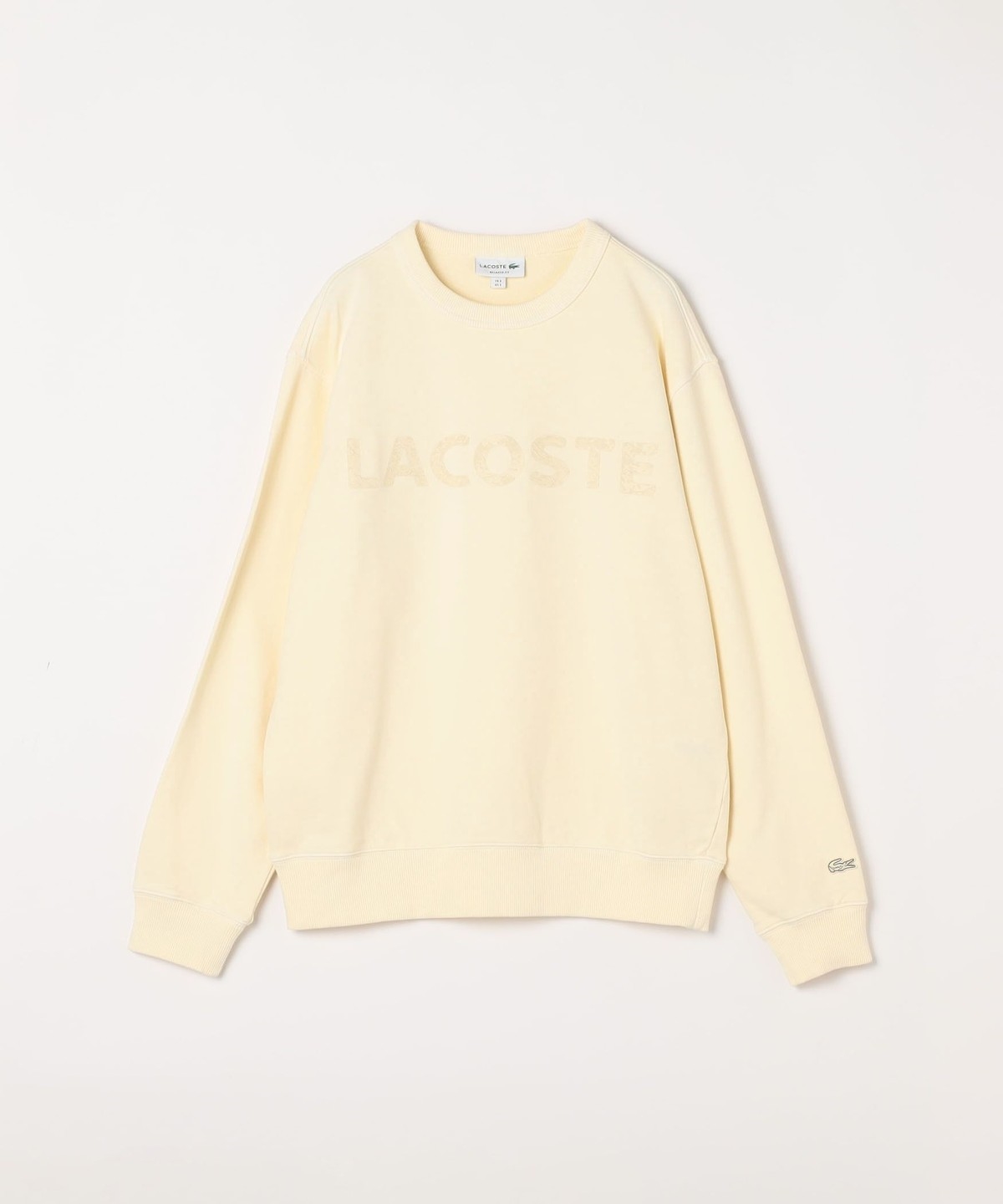 新品 未使用 LACOSTE 長袖カットソー クリーム色 新品タグ付き LACOSTE:〈洗濯機可能〉テクスチャー ロゴ クルーネック スウェット